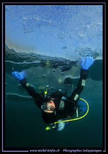 Having fun under the ice... :O)... by Michel Lonfat 